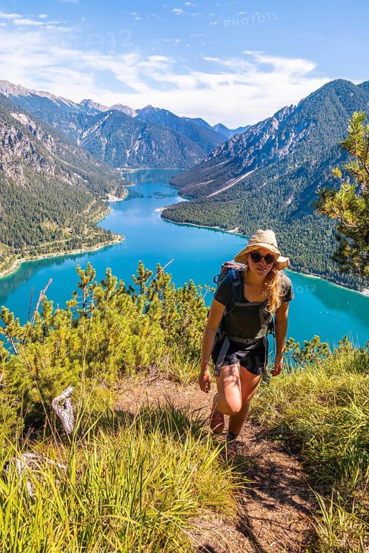 Hiker walking at Plansee