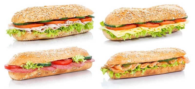 Collection Baguette Rolls Topped with Ham Salami Cheese Salmon Fish Sandwich Fresh cut out cut out Isolated
