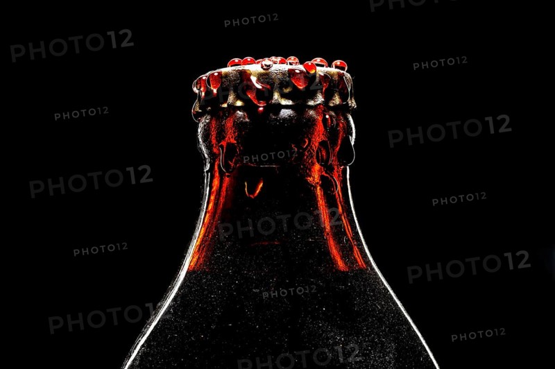 Bottle with crown cork with water drops