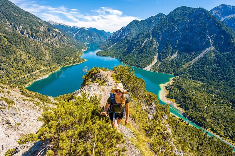 Hiker walking at Plansee