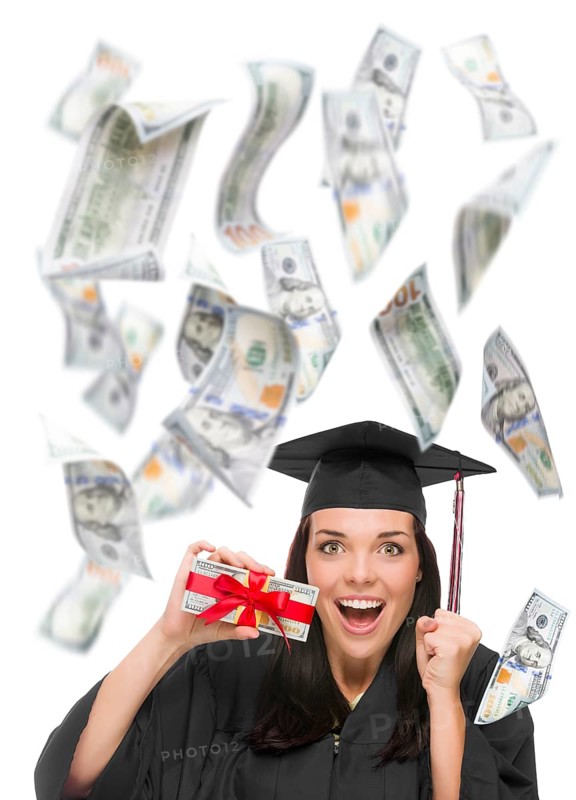 Excited female graduate in cap and gown holding stack of $100 bills with many falling around her on white
