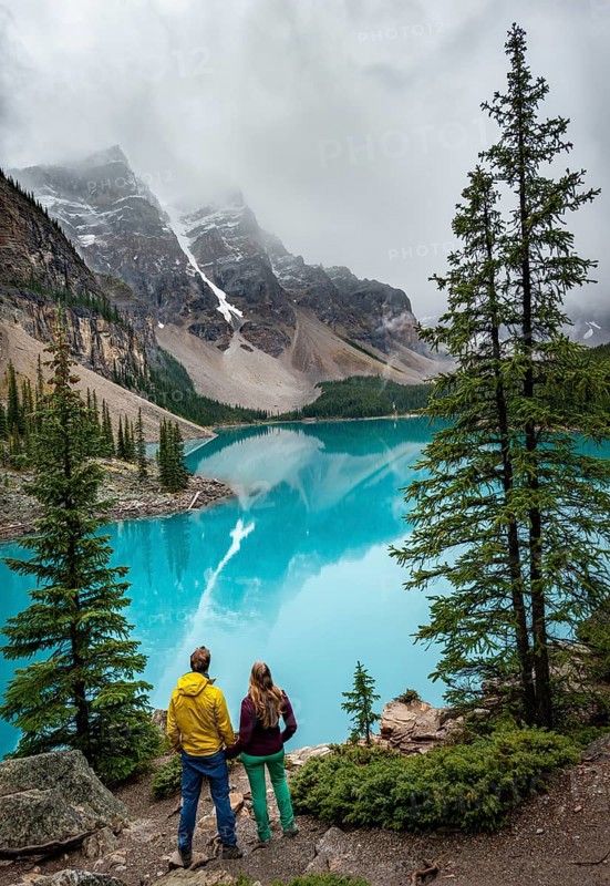 Couple looking over lake