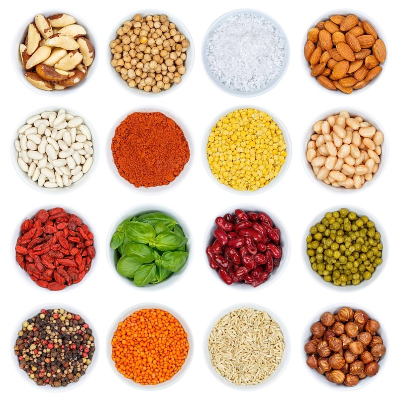 Herbs and spices vegetables collection nuts from above cutout on a white background