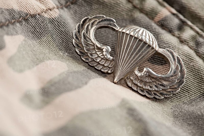 Paratrooper war medal on a camouflage material