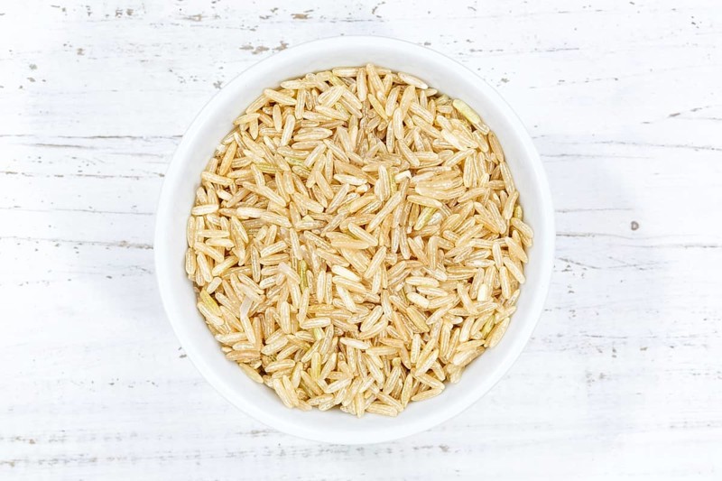 Rice Wild rice Natural rice raw from above Wooden board