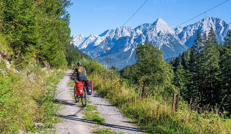 Cyclist on bike tour with mountain bike