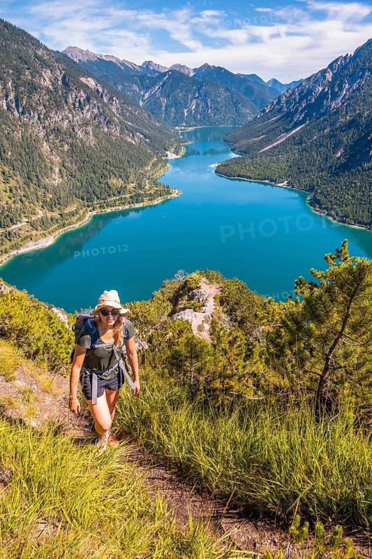 Hiker walking at Plansee