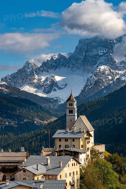 Church of Colle Santa Lucia with peak of Monte Pelmo in the background