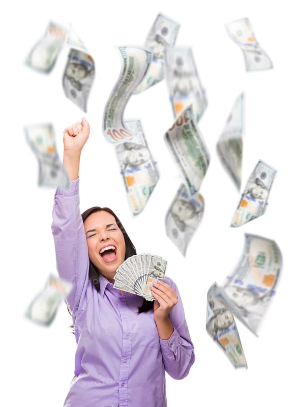 Celebrating young woman holding $100 bills with many others falling around her on white