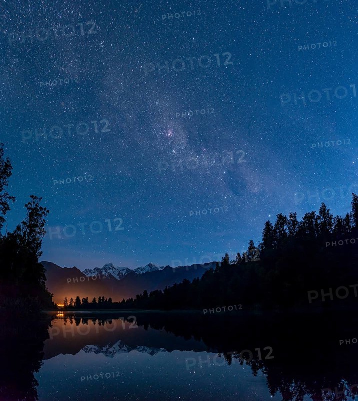 View of Mount Cook and Mount Tasman with starry sky and Milky Way