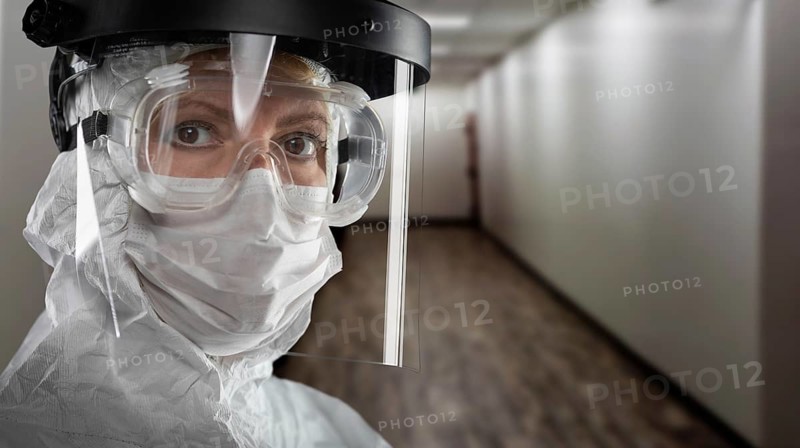 Banner of Female Doctor or Nurse In Medical Face Mask Shield and Protective Gear In Hospital Hallway