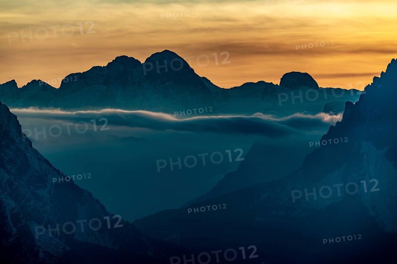 Mountain top of the Dolomites at sunset