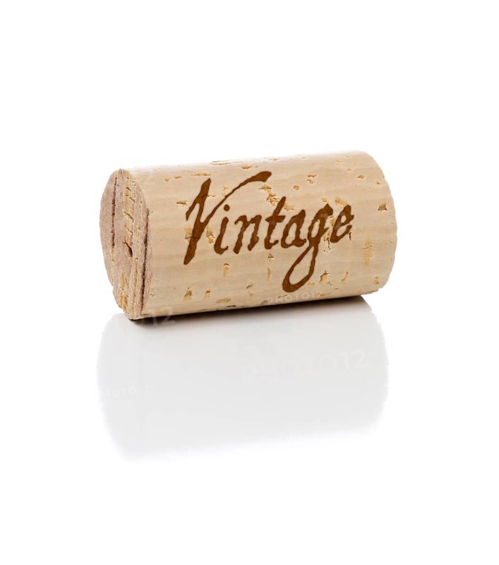 Vintage branded wine cork isolated on a white background