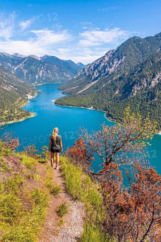 Hiker walking at Plansee
