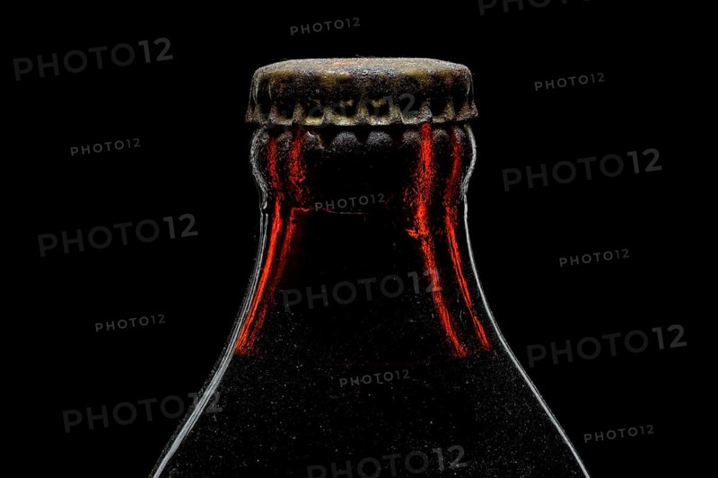 Old bottle with crown cork