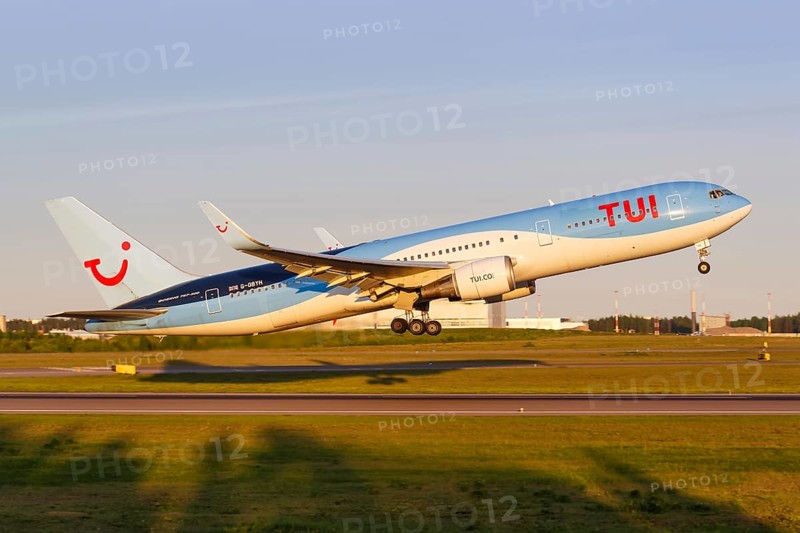 A TUI Boeing 767 with the registration G-OBYH takes off from Helsinki Airport