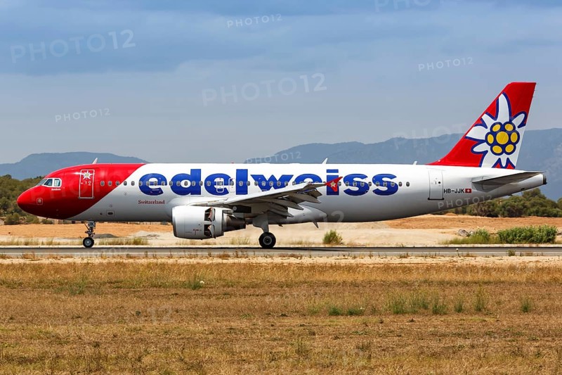 An Edelweiss Airbus A320 with registration HB-JJK lands at Palma de Majorca Airport