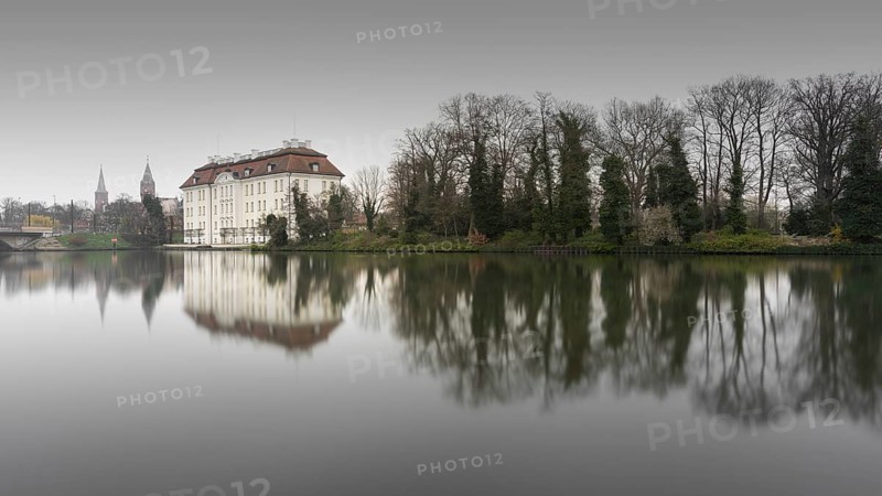 View over the Dahme river to Koepenick Castle in the morning in Berlin