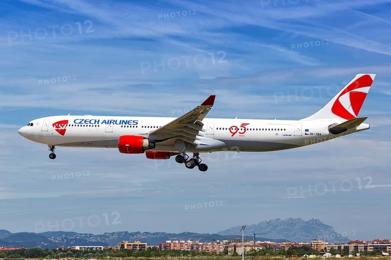 A Czech Airlines Airbus A330-300 with registration OK-YBA lands at Barcelona Airport