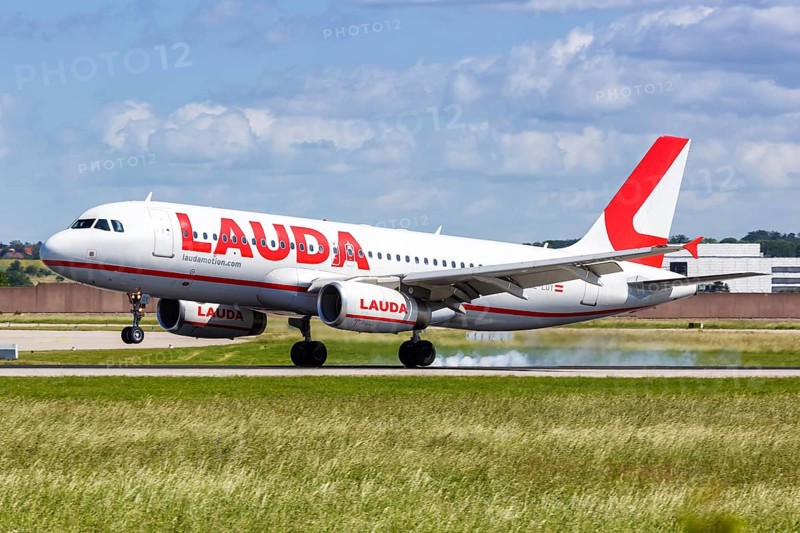 A Lauda Airbus A320 aircraft with registration number OE-LOY lands at Stuttgart Airport