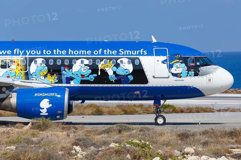 An Airbus A320 aircraft of Brussels Airlines with the registration number OO-SND with the special livery The Smurfs at Heraklion Airport
