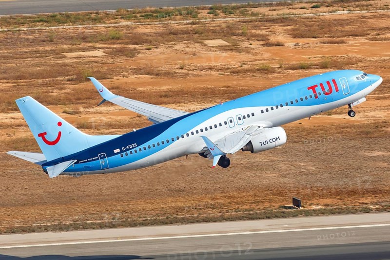 A TUI Boeing B737-800 with the registration G-FDZS takes off from Palma de Majorca Airport