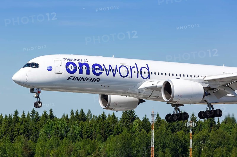 A Finnair Airbus A350-900 with the registration OH-LWB in the OneWorld special livery lands at Helsinki Airport