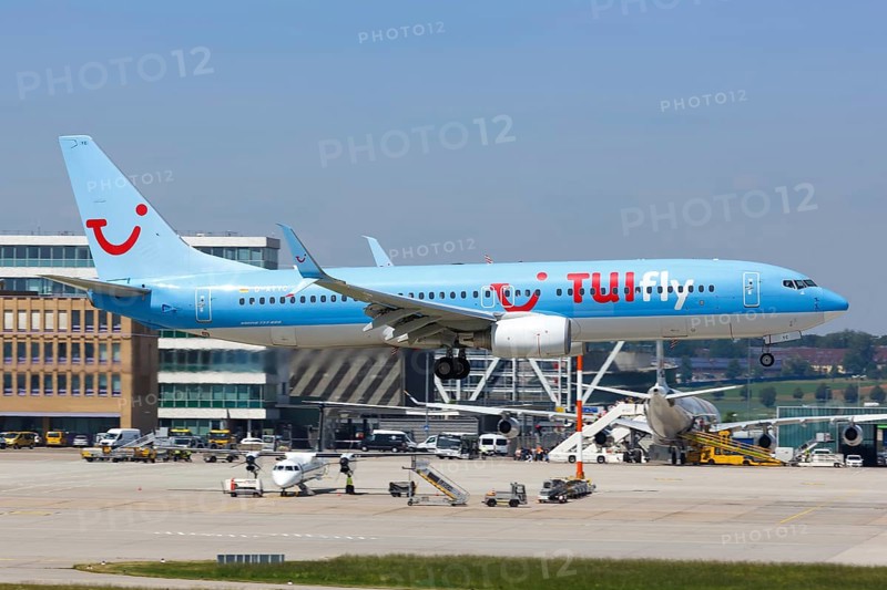 A TUIfly Boeing 737-800 with registration D-ATYC lands at Stuttgart Airport