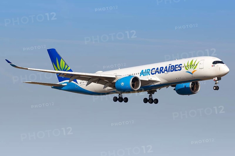 An Air Caraibes Airbus A350-900 with the registration F-HNET lands at Paris Orly Airport