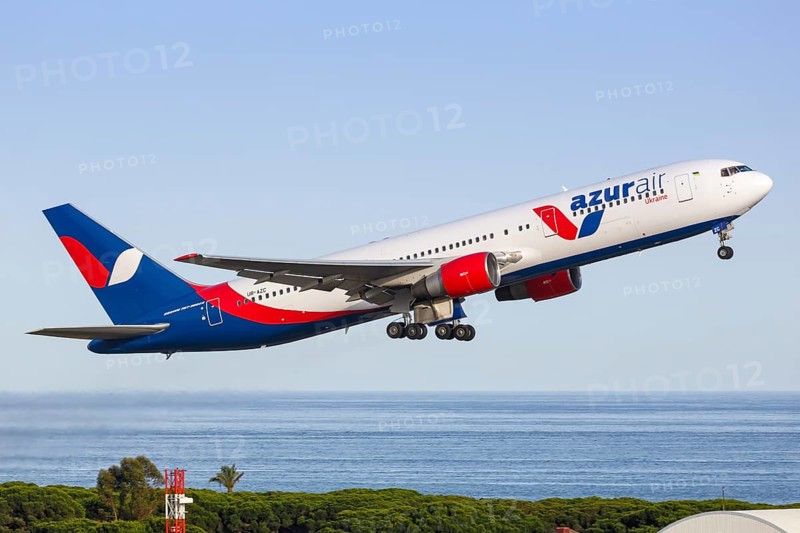 A Boeing 767-300ER of Azur Air Ukraine with the registration UR-AZC takes off from Barcelona Airport
