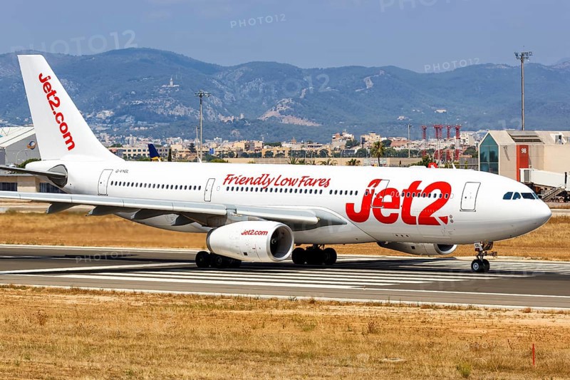 A Jet2 Airbus A330-200 with registration G-VYGL takes off from the airport in Palma de Majorca