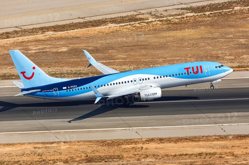 A TUI Boeing B737-800 with the registration G-FDZS takes off from Palma de Majorca Airport