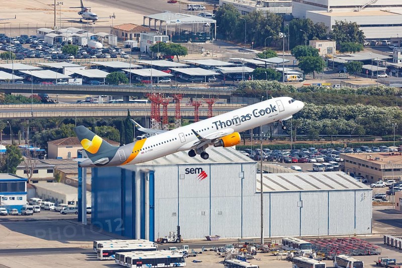 A Thomas Cook Airbus A321 with the registration G-TCDK takes off from Palma de Majorca Airport
