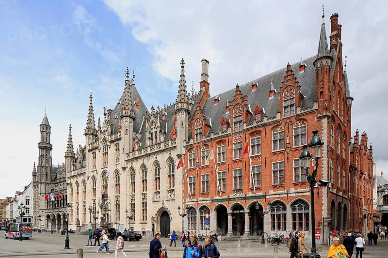Market with neo-gothic Provinciaal Palace Provinciaal Hof and Post Office