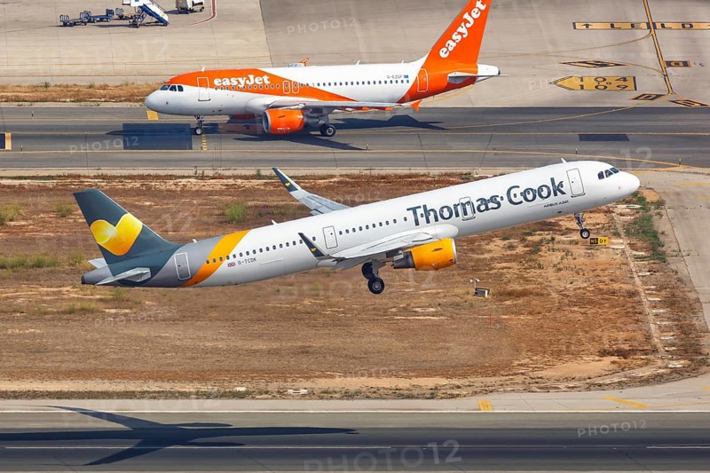 A Thomas Cook Airbus A321 with the registration G-TCDK takes off from Palma de Majorca Airport
