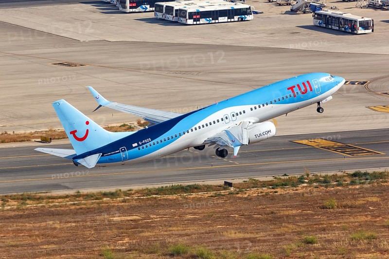 A TUI Boeing B737-800 with the registration G-FDZS takes off from Palma de Majorca Airport