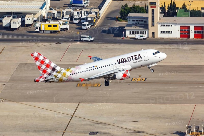 A Volotea Airbus A319 with the registration EC-MUX takes off from the airport in Palma de Majorca
