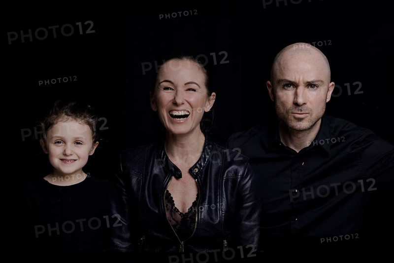 Family on black background