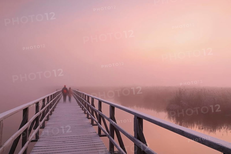 People on wooden footbridge