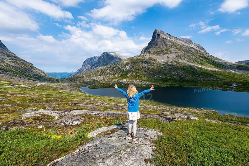 Little girl enjoying the view over a glacial valley