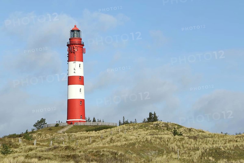 Lighthouse in dune landscape