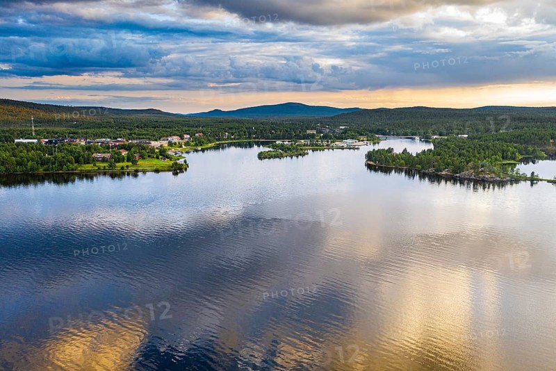 Clouds reflecting at sunset on Lake Inari