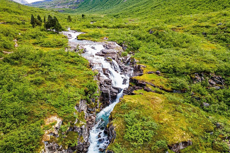 Waterfall running through the glacial valley