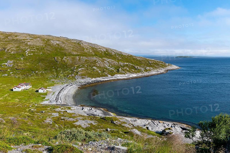 Remote little bay and settlement along the road to the Nordkapp
