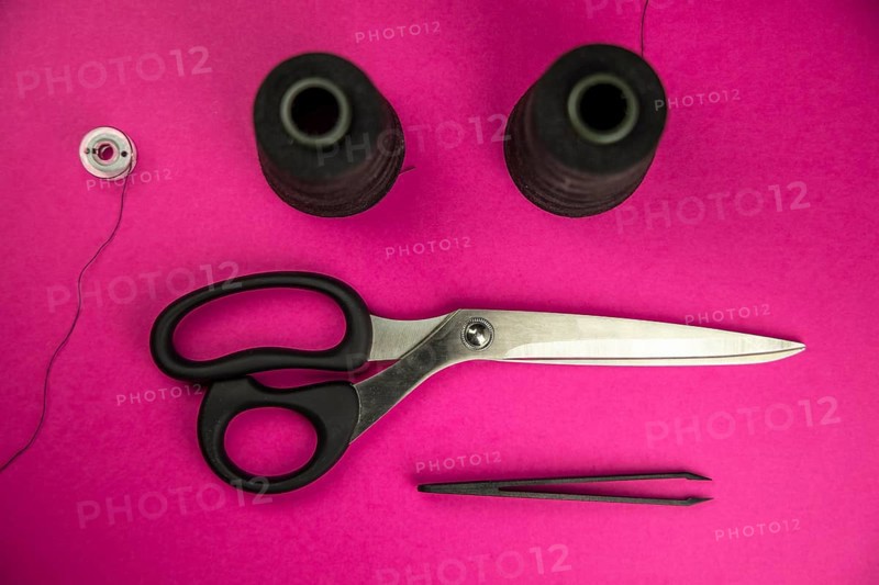 Black tailoring accessories as scissors