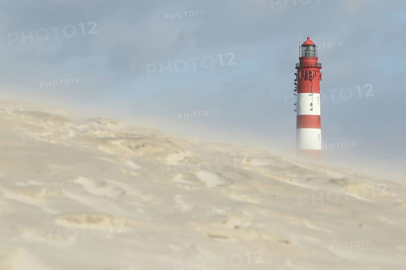 Lighthouse in dune landscape