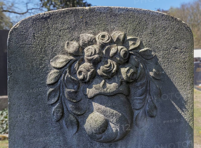 Relief with rose petals on a Jewish gravestone