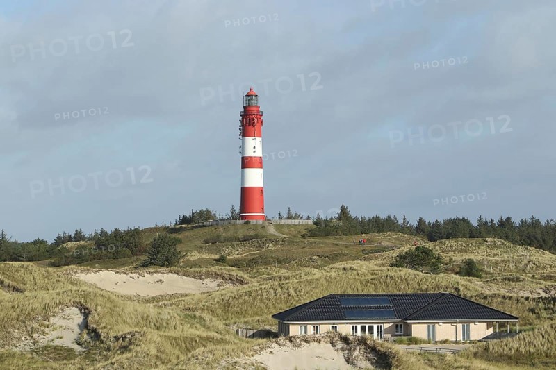 Lighthouse in dune landscape