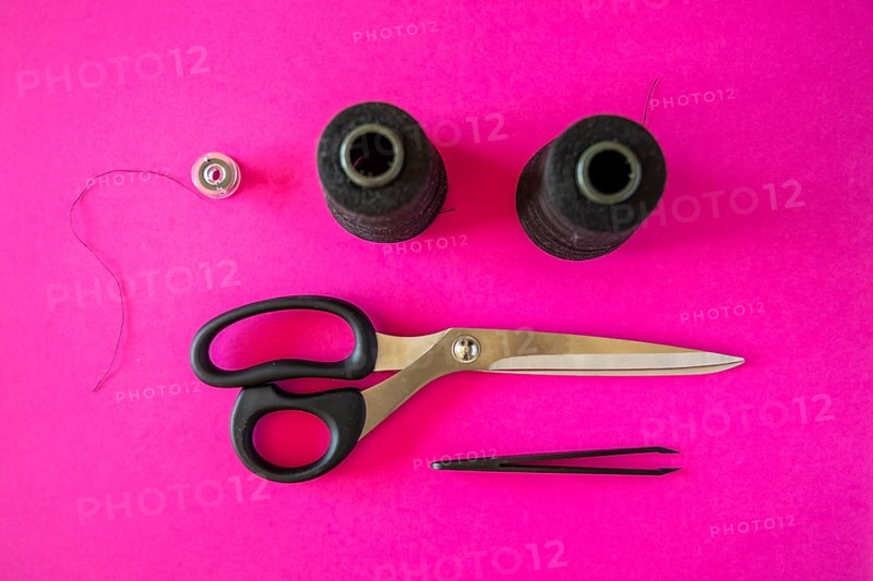 Black tailoring accessories as scissors