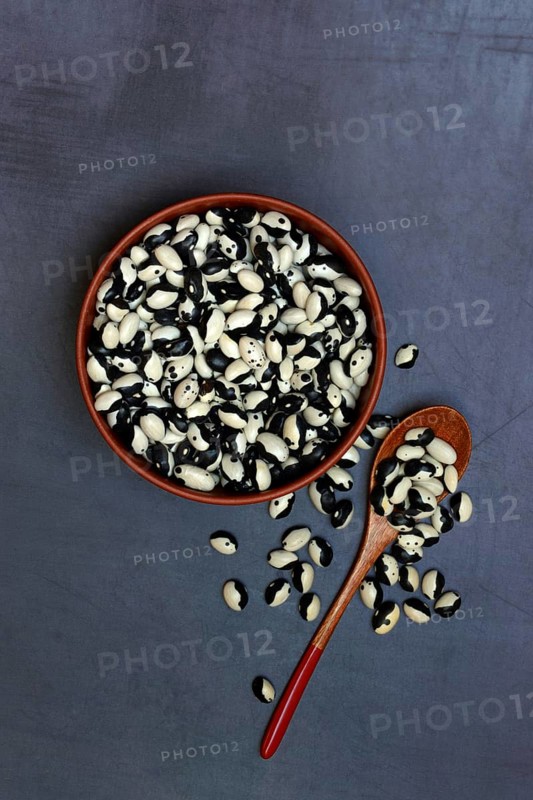 Dried beans in shell with spoon
